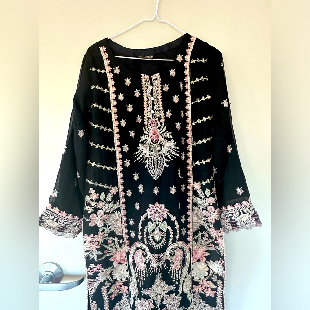 Black colour dress medium size with beautiful design